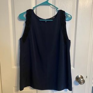 Navy sleeveless tank blouse with rosette details